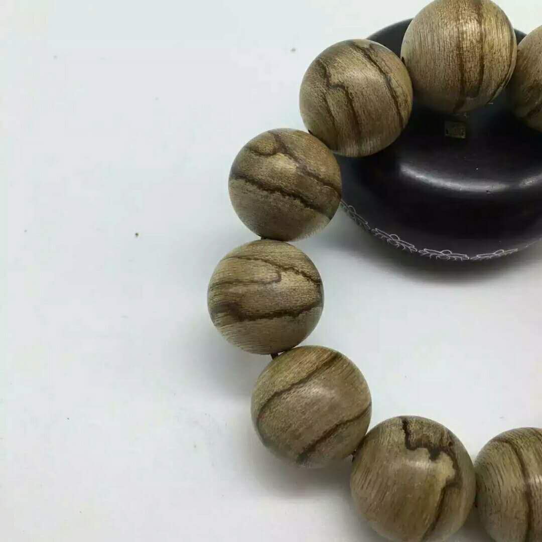 加里曼丹沉香手串有什么寓意,加里曼丹沉香108颗手串怎么搭配