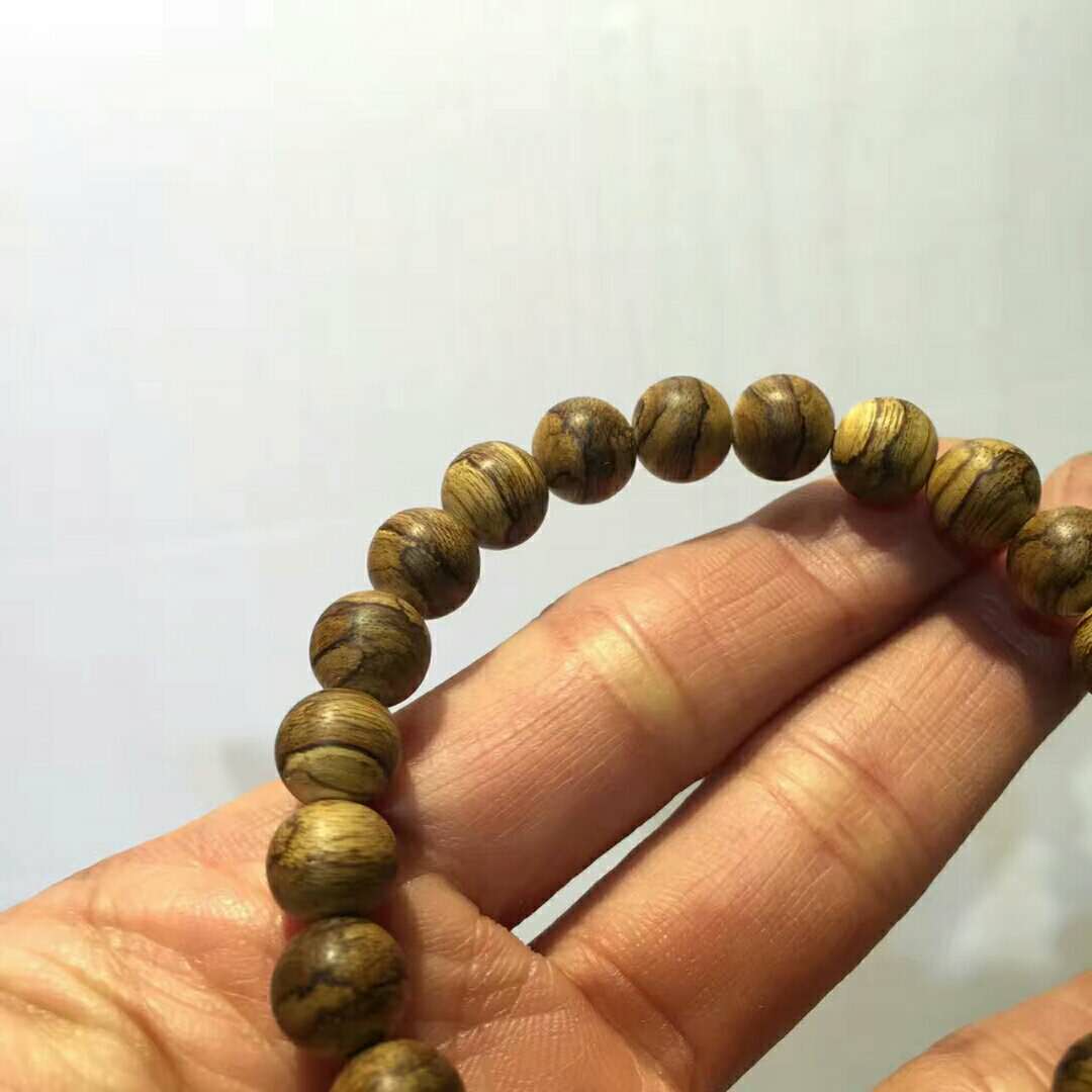 加里曼丹沉香手串有什么寓意,加里曼丹沉香108颗手串怎么搭配