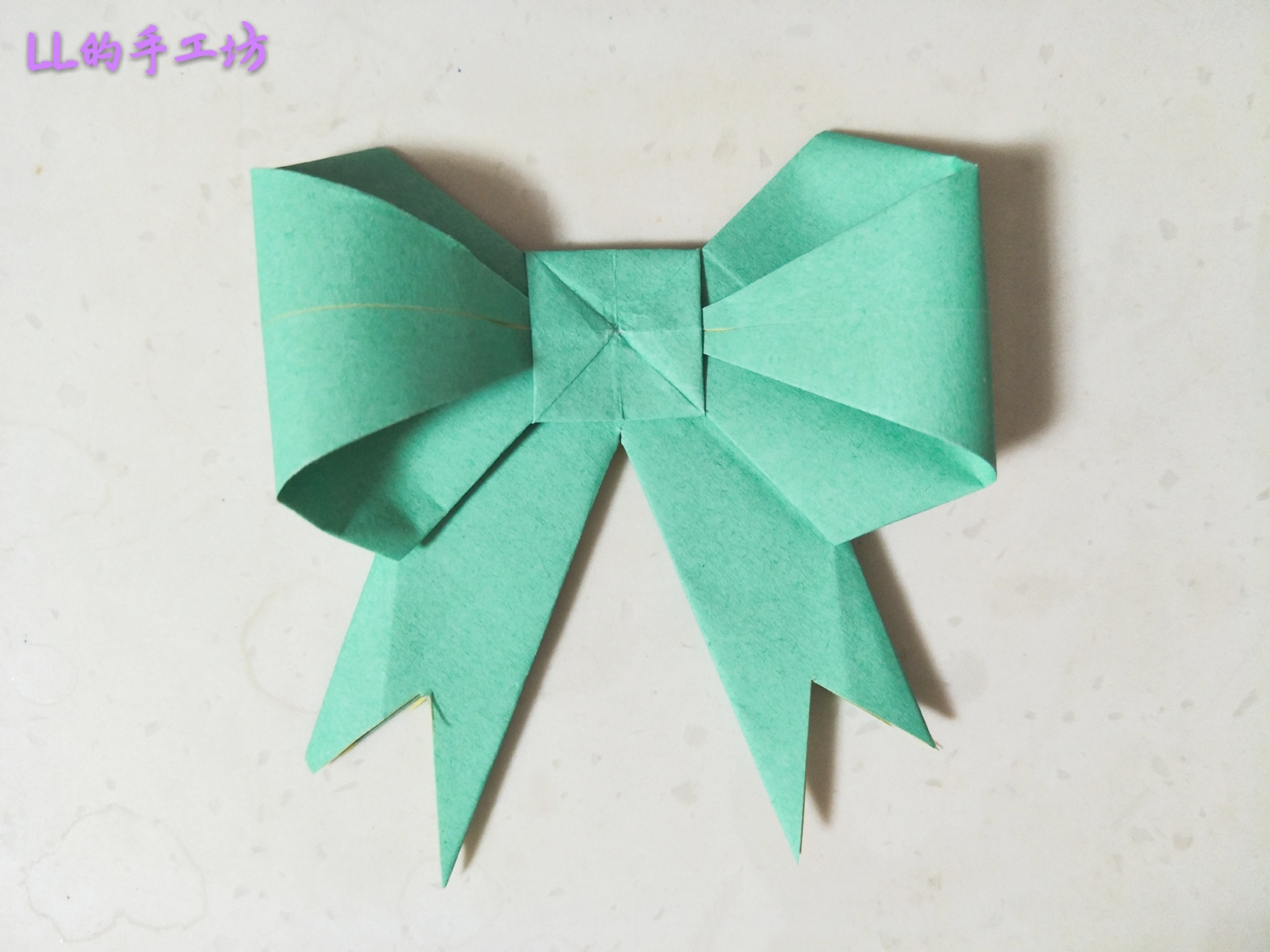 纸折的蝴蝶结教程,蝴蝶结怎么折出来简单又美丽