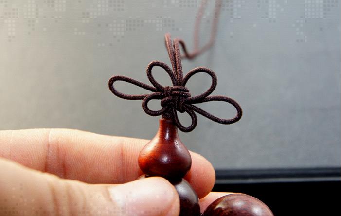 文玩手把串穿串教程,文玩人怎么开始盘串的