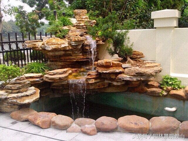 小型假山制作过程的小视频,小型假山鱼池制作视频
