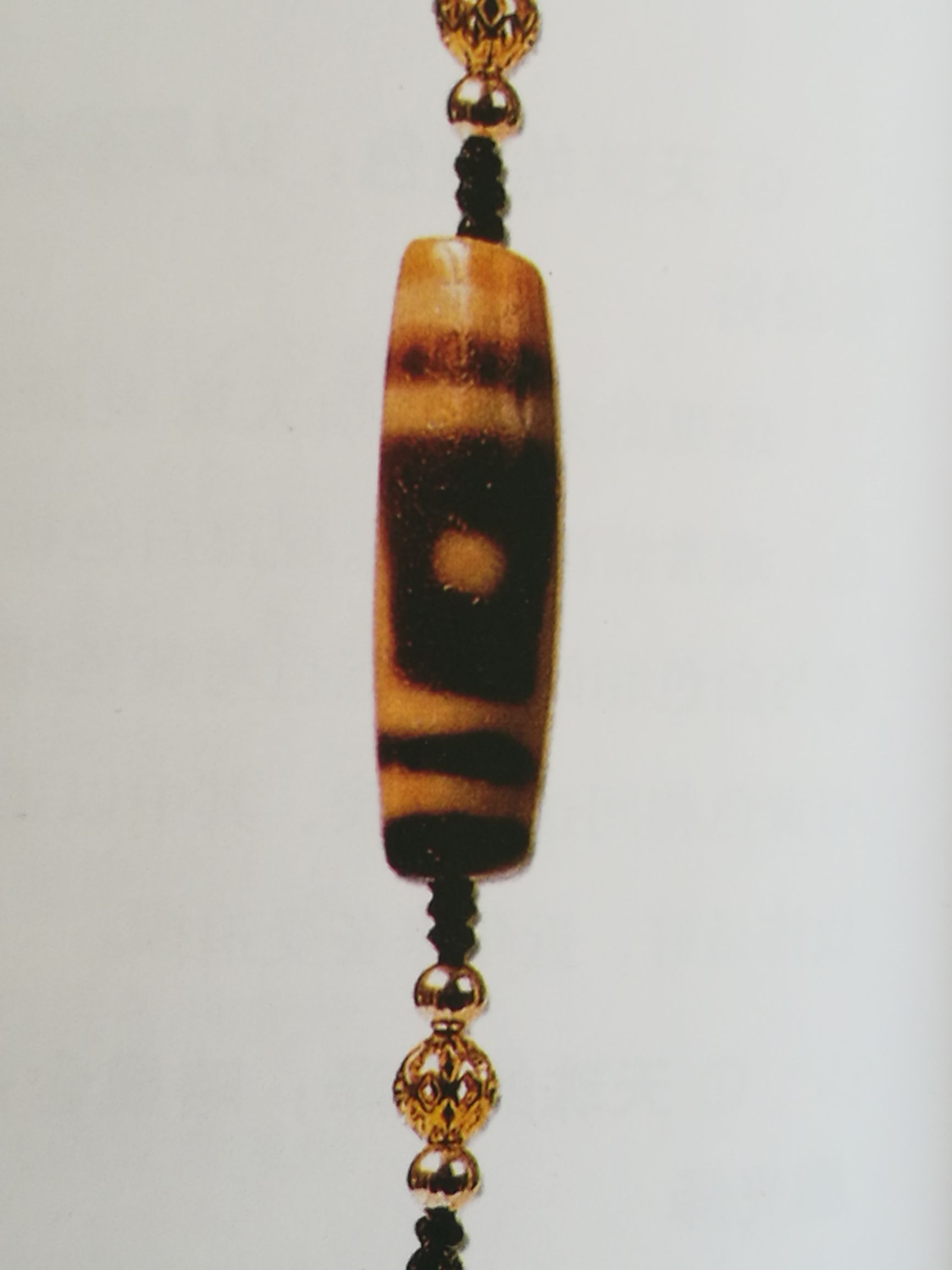 天珠最简单的鉴别方法,天珠鉴别及佩戴功效