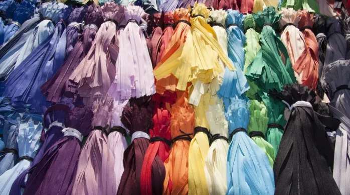 仅凭3毛钱的拉链撬动50亿大生意，一位流水线普通工人的逆袭史