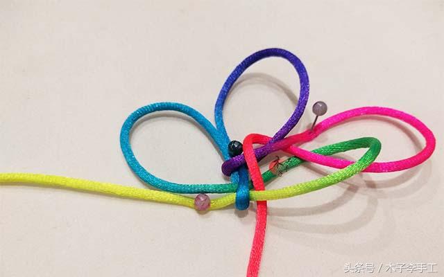 怎样编织酢浆草结的编法图解步骤,手工红绳编织蝴蝶结教程