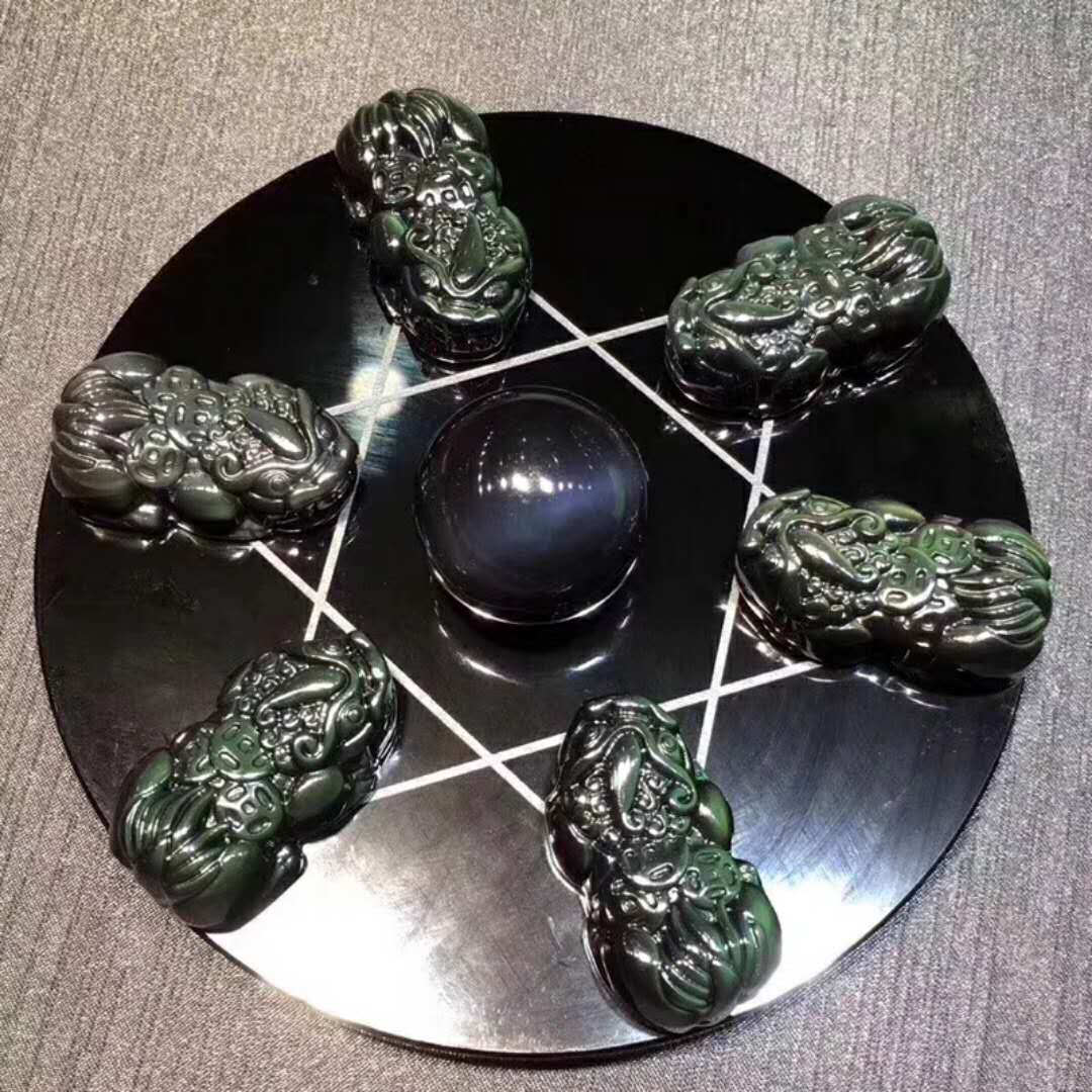 黑曜石貔貅摆件一对开光,开光六字真言黑曜石七星阵摆件