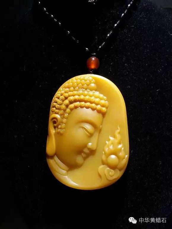 顶级的黄蜡石与和田玉的区别,老干皮顶级黄蜡石原石图片