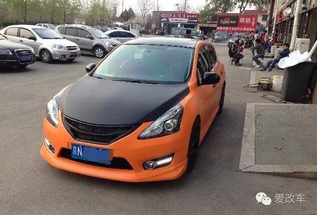 日产骐达中央扶手箱改装,日产的小精灵骐达改装案例