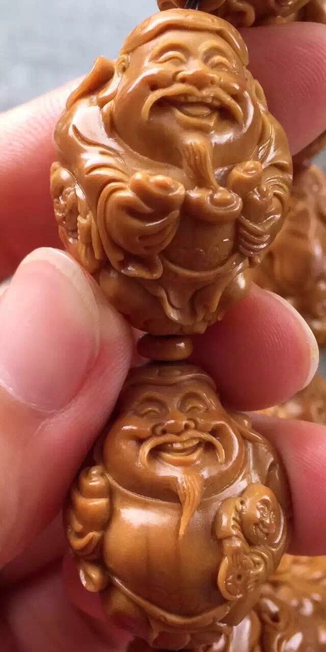 橄榄核雕有点轻怎么处理,橄榄核雕脏了可不可以洗