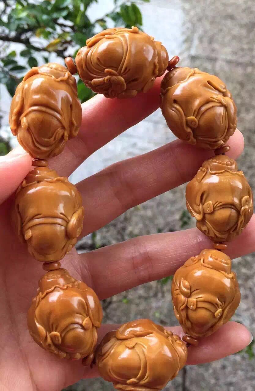 橄榄核雕有点轻怎么处理,橄榄核雕脏了可不可以洗