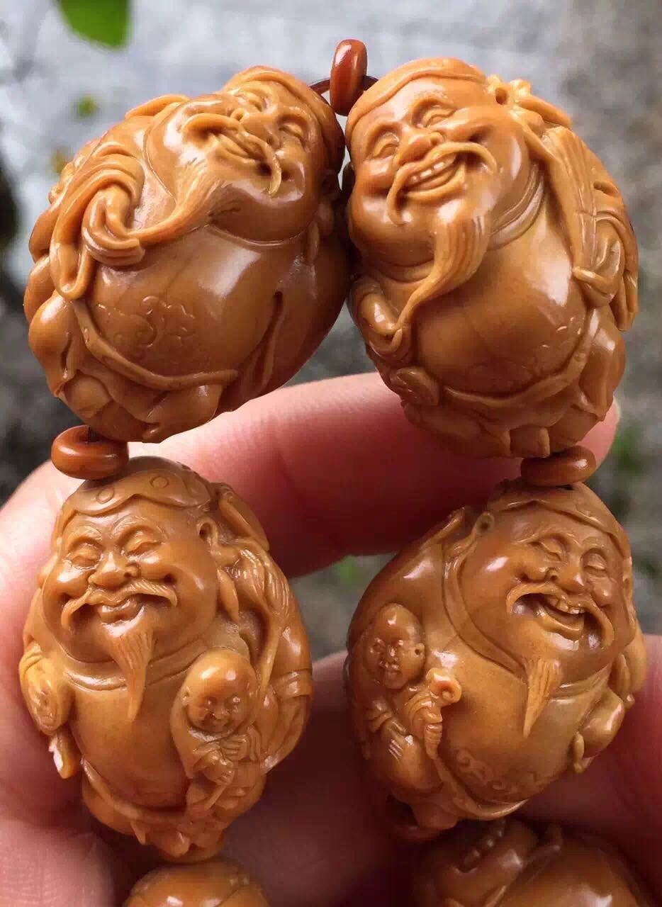 橄榄核雕有点轻怎么处理,橄榄核雕脏了可不可以洗