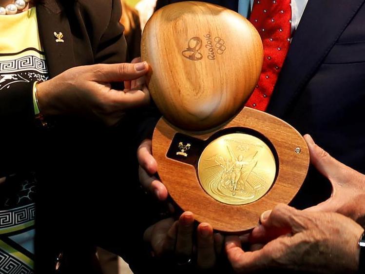 08年金镶玉奥运奖牌是24k金吗,2008奥运金镶玉金牌什么样