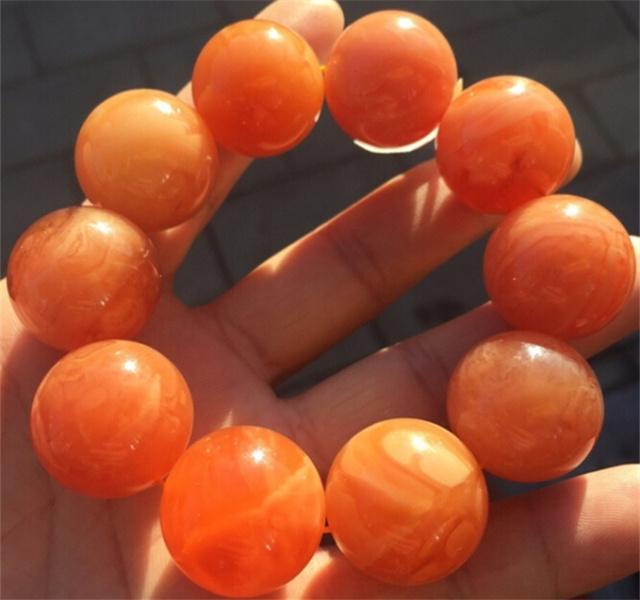 血蜜蜡的颜色是用钴60做的吗,琥珀蜜蜡价格内幕