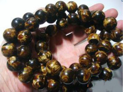 蜜蜡造假鉴别,蜜蜡造假技术有哪些