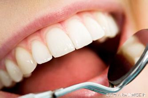 镶一口烤瓷牙到底好不好,镶的烤瓷牙有什么不习惯的吗