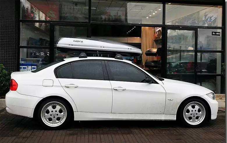 轿车行李架上面放什么是不违规的,汽车行李架放自行车违法吗