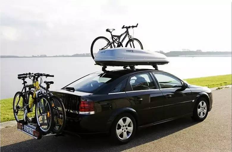 轿车行李架上面放什么是不违规的,汽车行李架放自行车违法吗