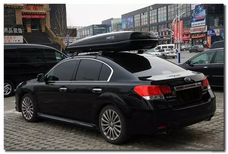 轿车行李架上面放什么是不违规的,汽车行李架放自行车违法吗