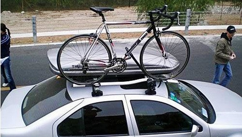 轿车行李架上面放什么是不违规的,汽车行李架放自行车违法吗