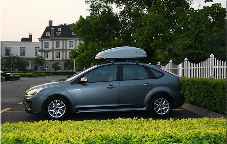 轿车行李架上面放什么是不违规的,汽车行李架放自行车违法吗