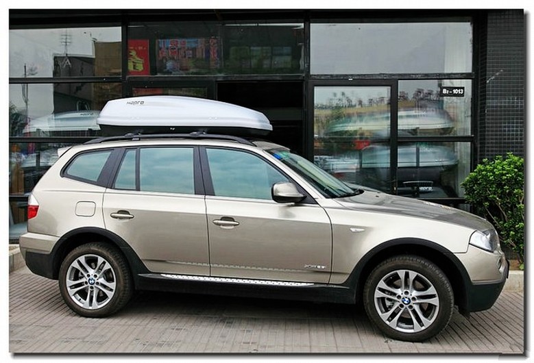 轿车行李架上面放什么是不违规的,汽车行李架放自行车违法吗