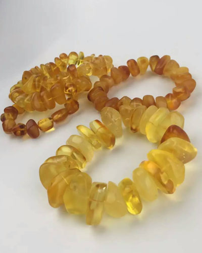 漂亮蜜蜡手串图片大全,蓝精灵琥珀怎么辨别真假