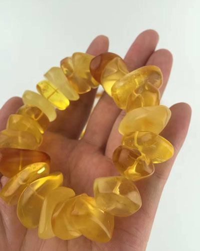 漂亮蜜蜡手串图片大全,蓝精灵琥珀怎么辨别真假