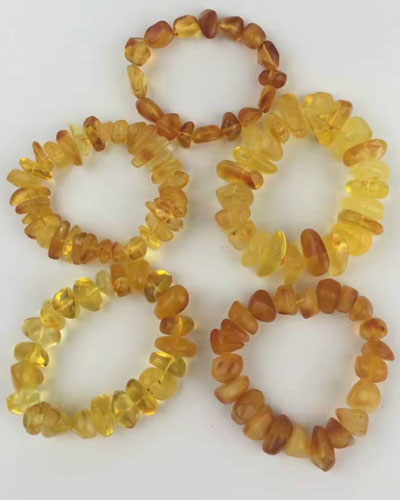 漂亮蜜蜡手串图片大全,蓝精灵琥珀怎么辨别真假