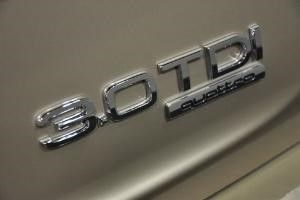 汽车后面英文字母什么意思,汽车后面的tsi字母代表什么