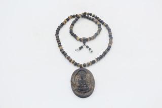 羊角项链鉴别,金犀牛项链