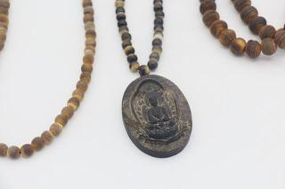 羊角项链鉴别,金犀牛项链