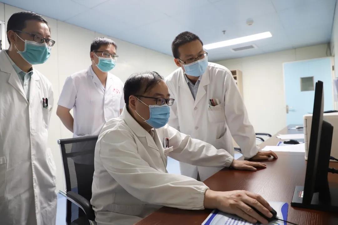 兴国县中医院喜迎温优良、易会兴博士进行业务指导