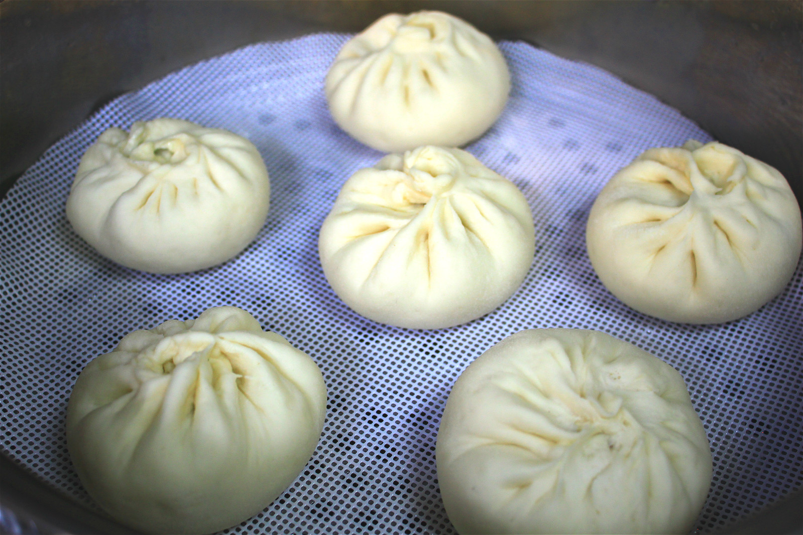 韭菜包子蒸几分钟最鲜,怎样蒸韭菜包子韭菜鲜嫩爽滑