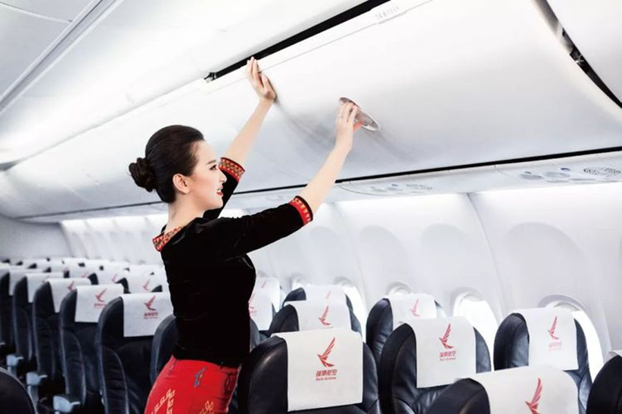 中国国际航空历代空姐制服,瑞丽航空空姐制服