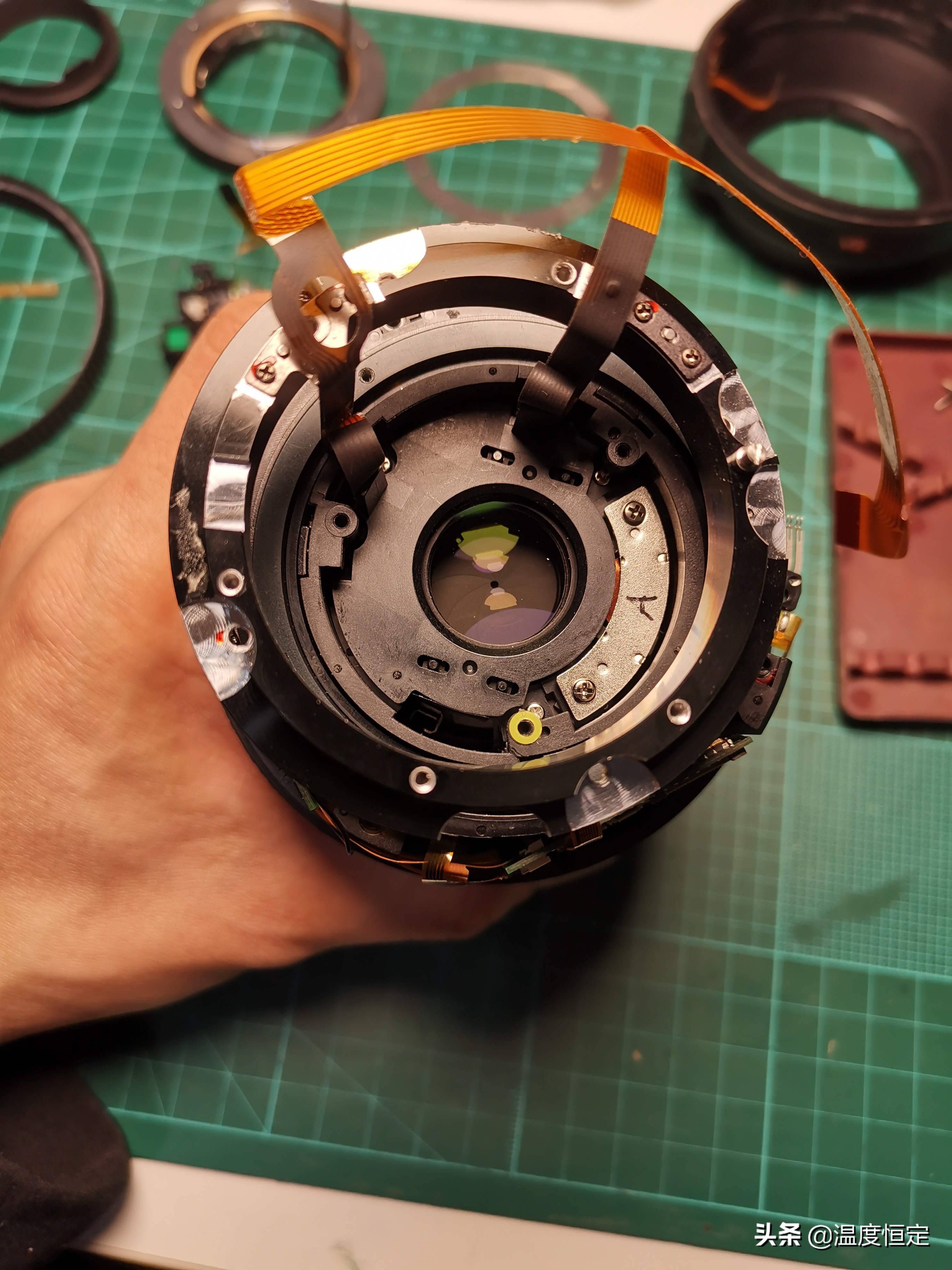 尼康镜头防抖打开一直响,尼康24-120镜头防抖怎么开