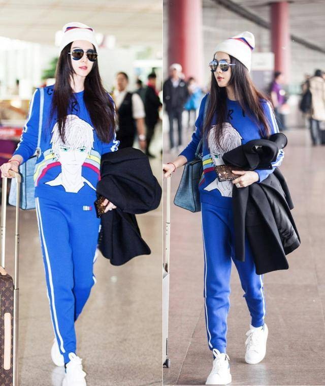 范冰冰英伦风穿搭现身时装周,范冰冰穿衣搭配大红裙现身香港