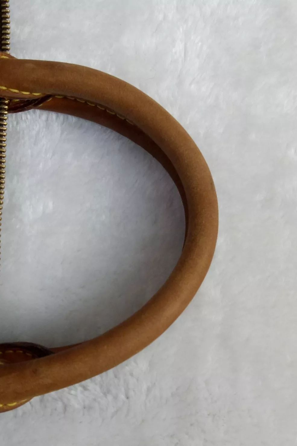 lv老花手柄脏了怎么办,lv手柄有瑕疵正常吗