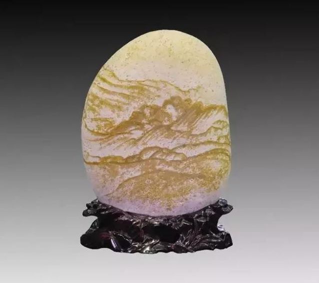 捡到这种石头千万别扔价值2亿,河里捡到的价值不菲的石头