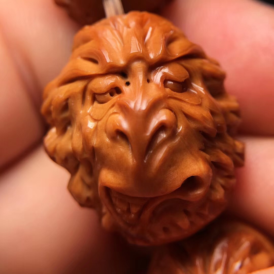 橄榄核十八罗汉手串怎么穿好盘玩,猴头手串和橄榄核手串哪个好盘