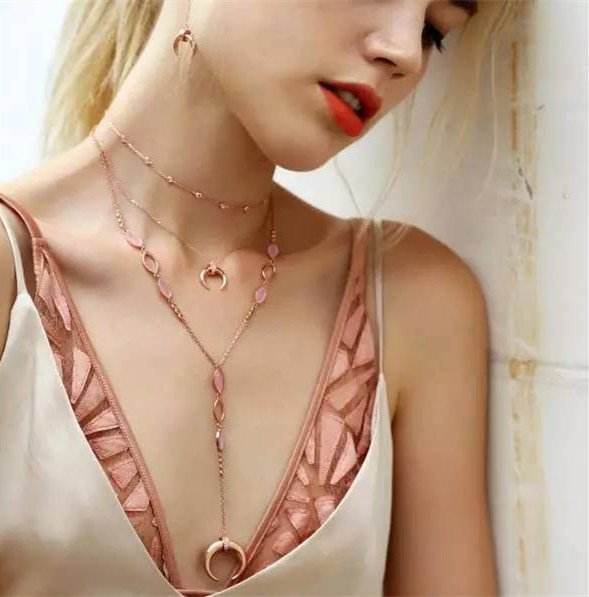 四个珍珠项链穿法,4种戴法的项链