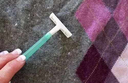 羊毛毛衣起球怎么处理,羊毛衣掉毛球怎么办