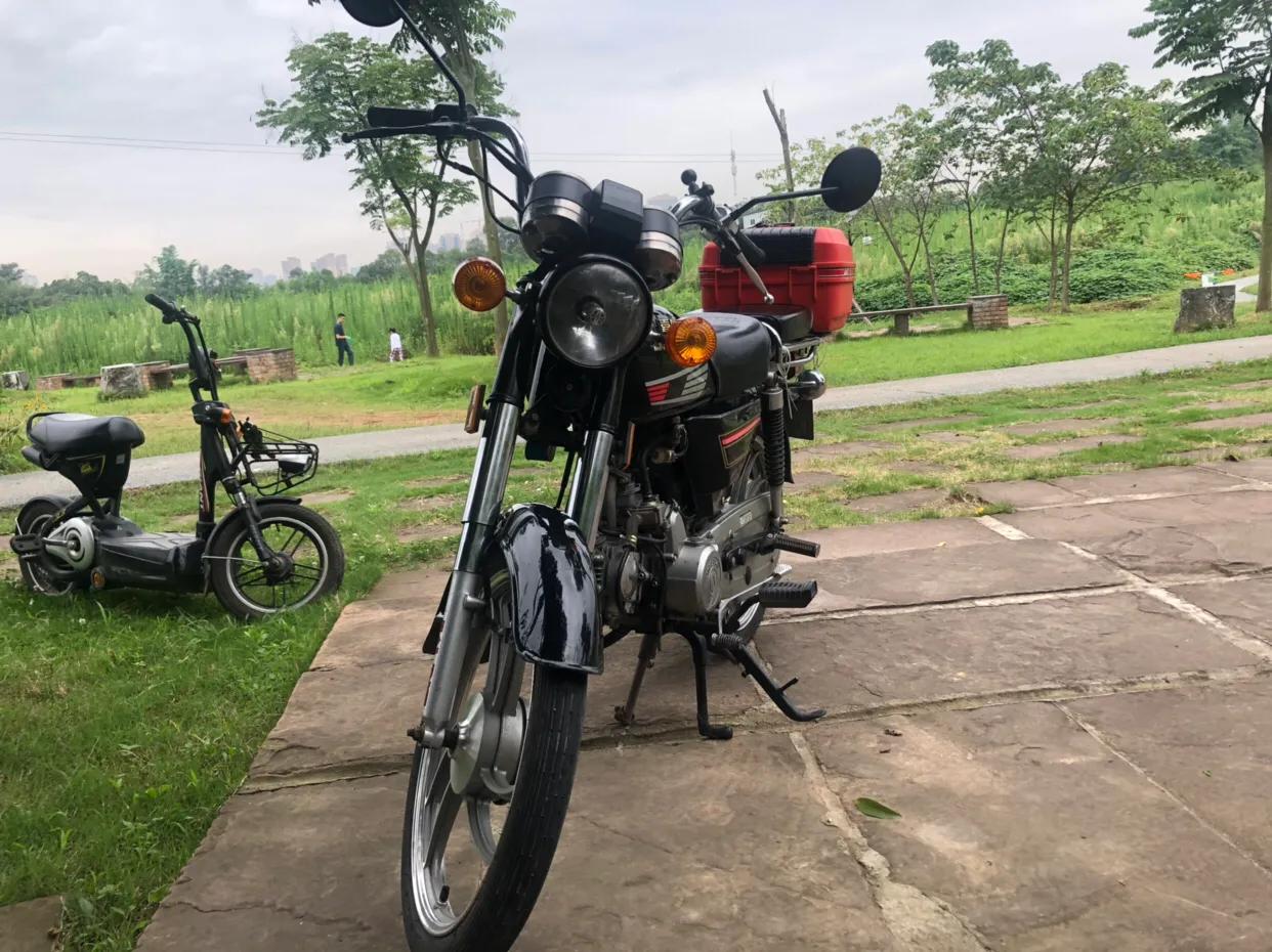 嘉陵70百公里多少油,嘉陵70摩托车百公里油耗是多少