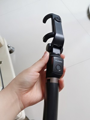 华为有线自拍杆的使用方法及操作,华为手机用自拍杆的使用方法图解