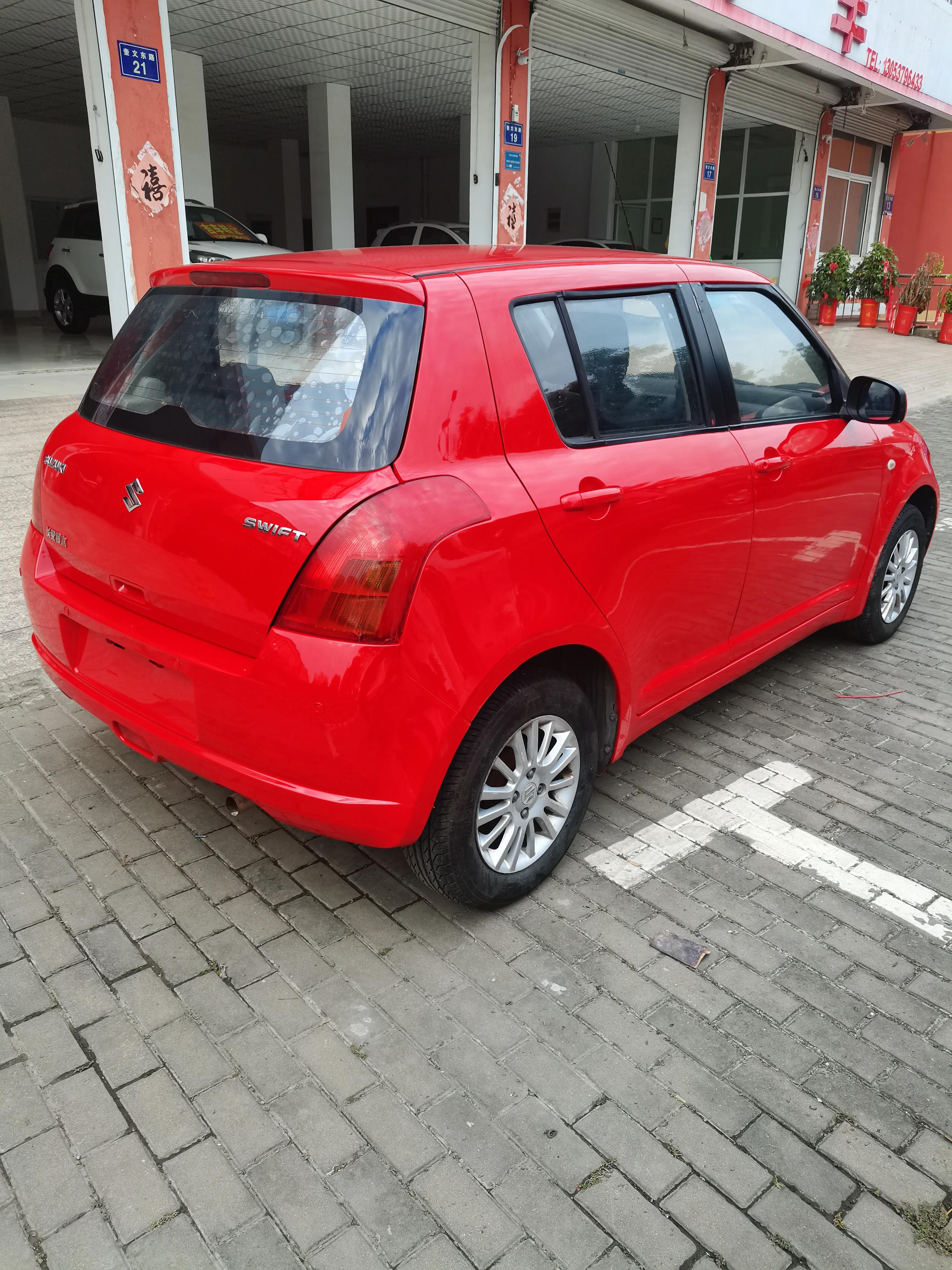 铃木红色雨燕超清,红颜色的小铃木