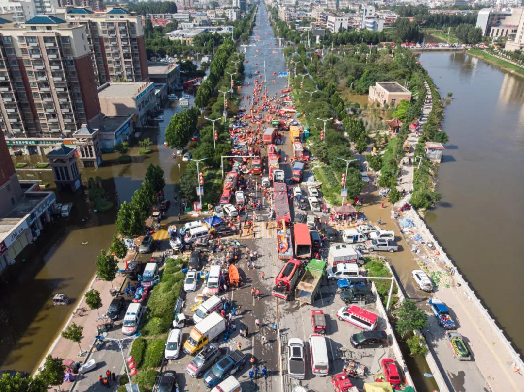 人在新乡，我们的家还在水里