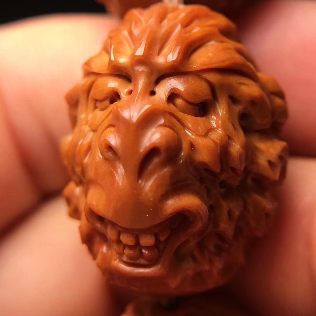 橄榄核十八罗汉手串怎么穿好盘玩,猴头手串和橄榄核手串哪个好盘