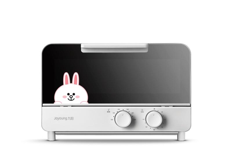 布朗熊与可妮兔背靠背坐着,布朗熊和可妮兔吃西瓜