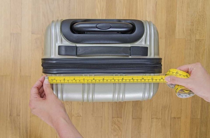 出国坐飞机行李托运收费吗,坐飞机出国能带多少黄金