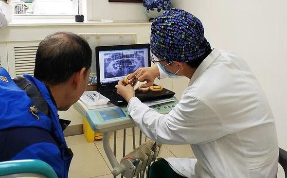 牙齿已经晃动可还是很难拔掉,怎么把晃动的牙齿自己拔掉