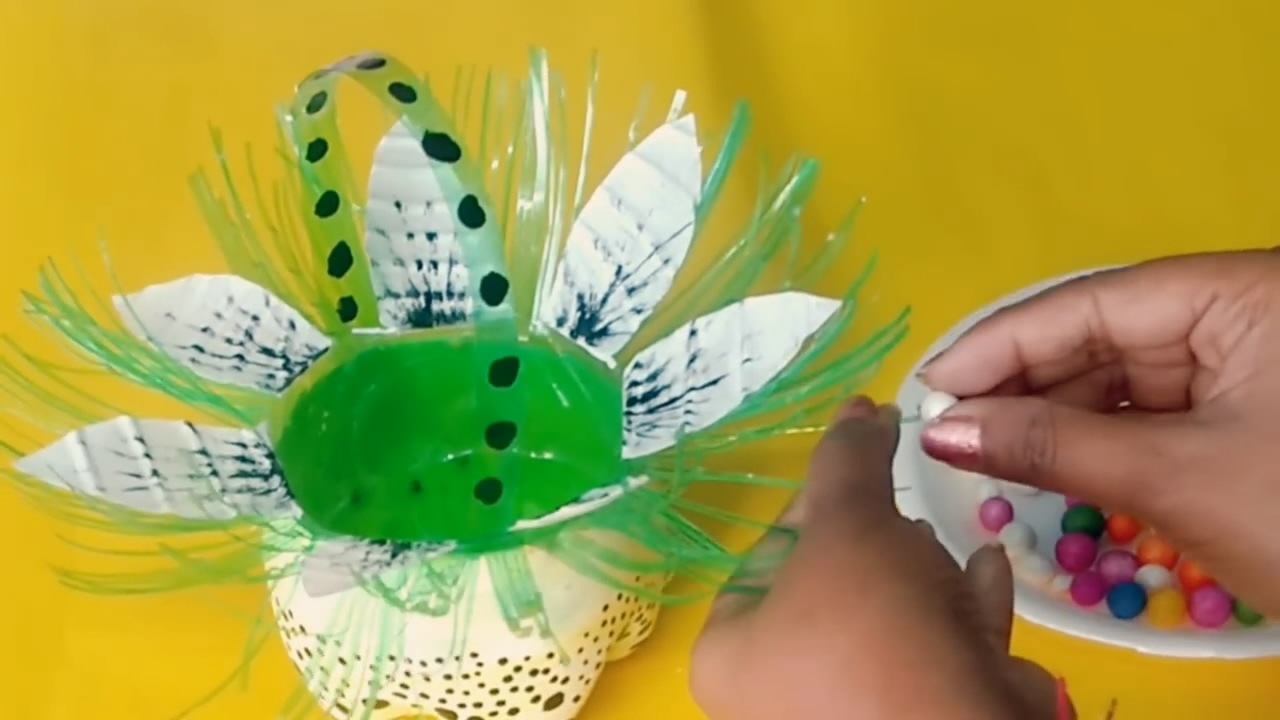 废瓶子改造花篮,塑料瓶子改造大全简单