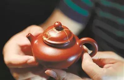 紫砂壶裂了怎么补救,紫砂壶裂了一点如何自己修复